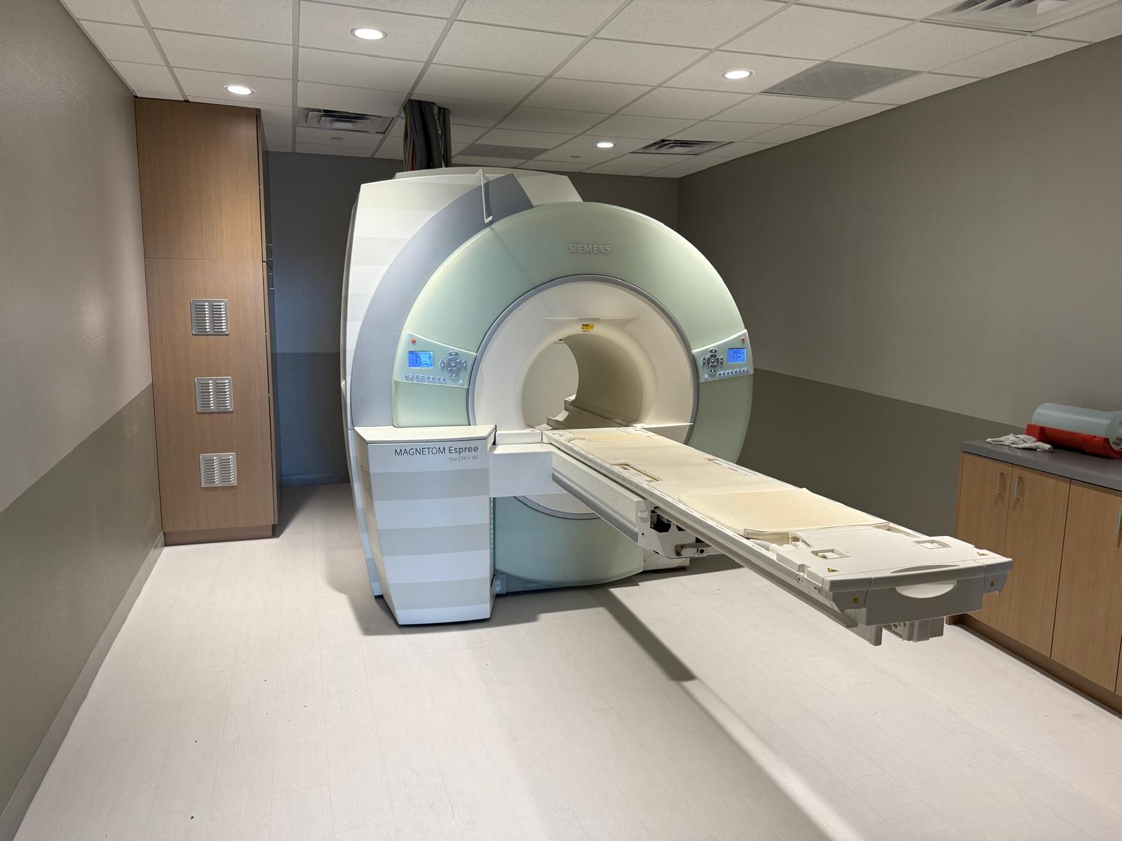 Siemens MAGNETOM Espree 1.5T open-bore MRI scanner in a finished, patient-ready scan room